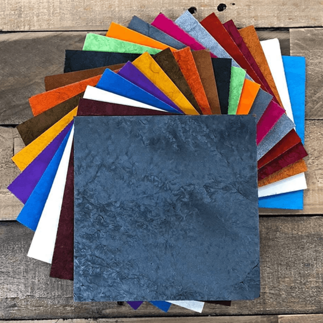 Real flake color samples available from Nick's Concrete Coating — full range of chip blends